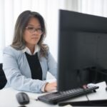 Cloud Computing In Hr Software: What You Need To Know 1 Cloud computing in HR software: an HR manager using a cloud HR platform in a modern office