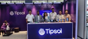 Tipsoi team standing at their branded booth with attendance and access control devices on display at ISEB 2026
